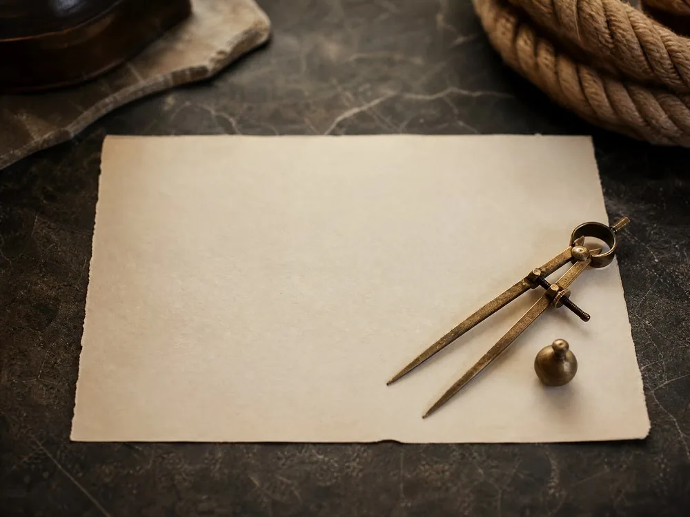 Brass dividers on a blank sheet